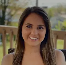 Smiling woman outdoors on a sunny day